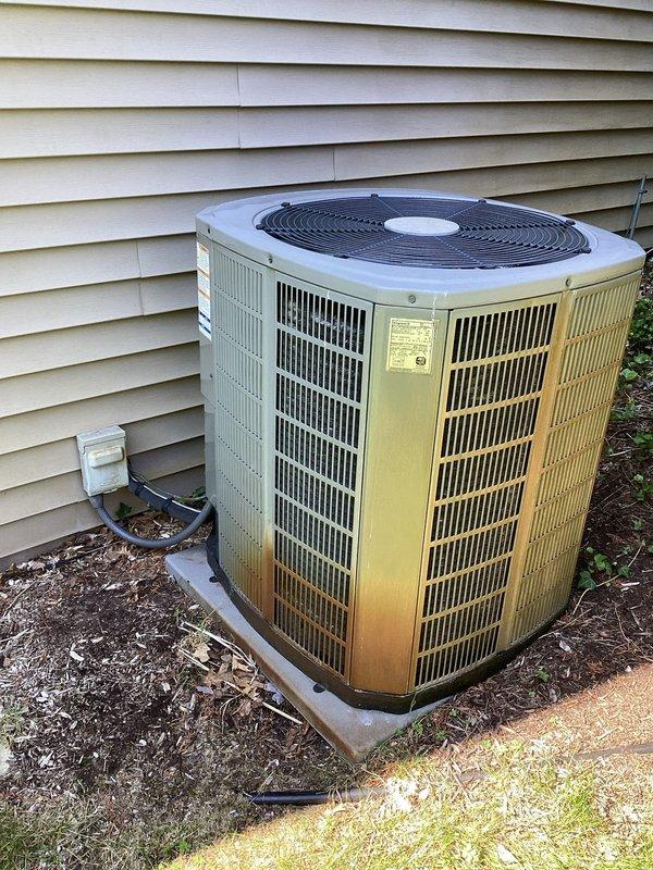 Completed annual first visit maintenance on residential split system HVAC unit as part of Gold Level planned maintenance program. Performed comprehensive inspection of outdoor condenser unit positioned on concrete pad and indoor air handler system located in basement. Inspected condenser coils, fan operation, refrigerant lines, and electrical connections on exterior unit. Evaluated indoor ductwork system, air handler components, and overall system performance. Verified proper operation of all mechanical and electrical components. Customer maintains their own filter replacements per established routine. System operating within normal parameters. Documentation completed with photographic records of equipment condition.