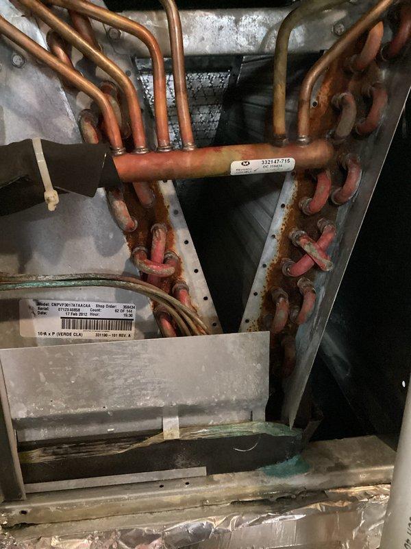 Completed scheduled air conditioning maintenance per HVAC membership agreement. Performed comprehensive inspection of outdoor condensing unit, including examination of electrical components, capacitor, and wiring connections. Inspected indoor evaporator coil assembly, copper refrigerant lines, and heat exchanger. All components found to be operating within normal parameters with typical age-related wear patterns observed on exterior surfaces and internal hardware.