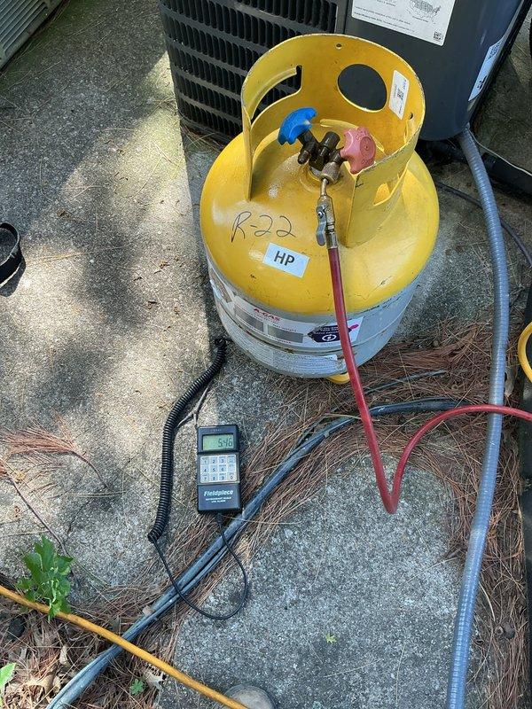 Completed installation of Lennox ML13KC1-024 outdoor condensing unit and ADP uncased evaporator coil. Recovered existing R-22 refrigerant from old system using recovery equipment prior to unit removal. Mounted new Lennox condenser on existing concrete pad alongside other HVAC units servicing the multi-unit building. Installed ADP uncased coil in air handler, made refrigerant line connections, and completed electrical hookup to existing meter bank. Reused existing thermostat to maintain customer's familiar control interface. System was pressure tested, evacuated, charged to manufacturer specifications, and tested for proper operation. All components functioning as designed with appropriate temperature differential across coil.