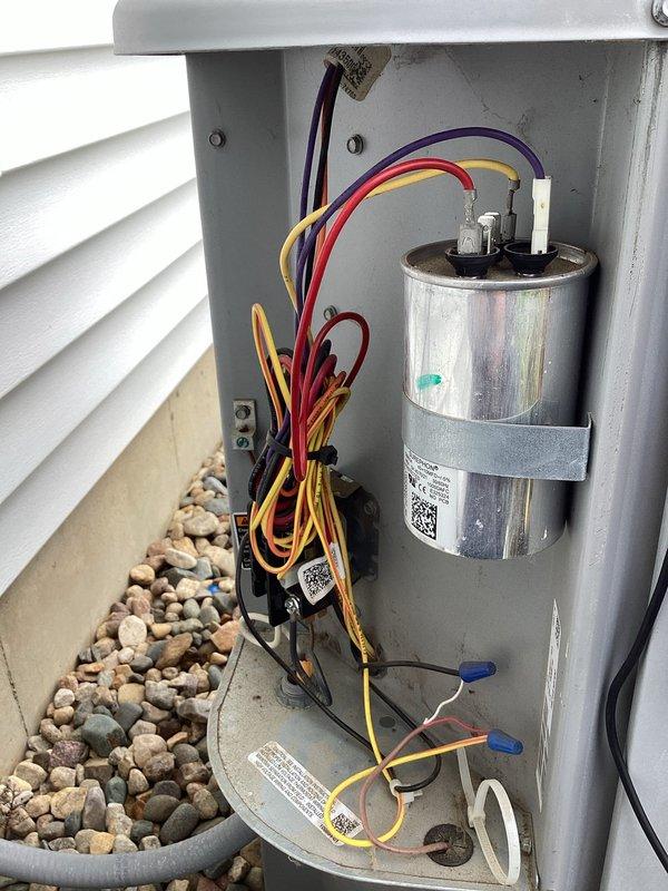 Completed planned air conditioning maintenance on church facility HVAC system. Performed comprehensive inspection of outdoor condensing unit including electrical disconnect panel, capacitor, contactor, and associated wiring connections. Applied approved cleaning and treatment products to system components. Inspected all electrical connections, terminals, and wire bundles for proper operation and secure mounting. Verified capacitor condition and functionality. System tested and confirmed operational upon completion of maintenance procedures.