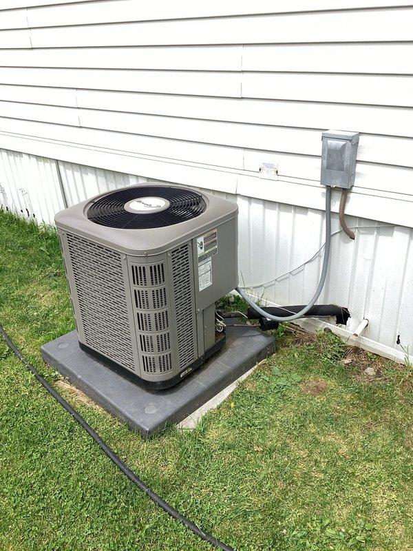 Responded to no cooling complaint on 6-year-old residential AC unit reportedly damaged by lightning surge. Performed comprehensive diagnostic evaluation of outdoor condensing unit including electrical system inspection, capacitor testing, and compressor circuit analysis. Previous contractor had recommended full system replacement; conducted thorough assessment of compressor functionality, contactor operation, and all electrical components to determine if repair was viable alternative to replacement. Documented unit condition and electrical compartment components with photographs for reference.