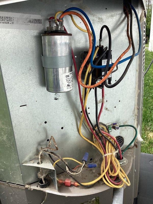 Responded to no cooling complaint on 6-year-old residential AC unit reportedly damaged by lightning surge. Performed comprehensive diagnostic evaluation of outdoor condensing unit including electrical system inspection, capacitor testing, and compressor circuit analysis. Previous contractor had recommended full system replacement; conducted thorough assessment of compressor functionality, contactor operation, and all electrical components to determine if repair was viable alternative to replacement. Documented unit condition and electrical compartment components with photographs for reference.