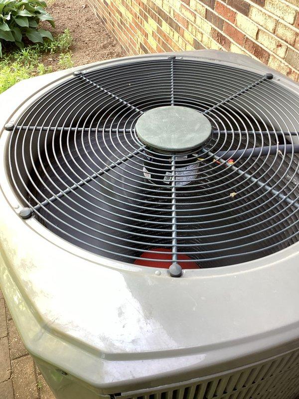 Replaced failed factory-original ECM outdoor condenser fan motor with PSC motor upgrade on 10+ year old unit experiencing no cooling condition. Also installed new run capacitor to support the PSC motor conversion. Unit tested and operational upon completion.
