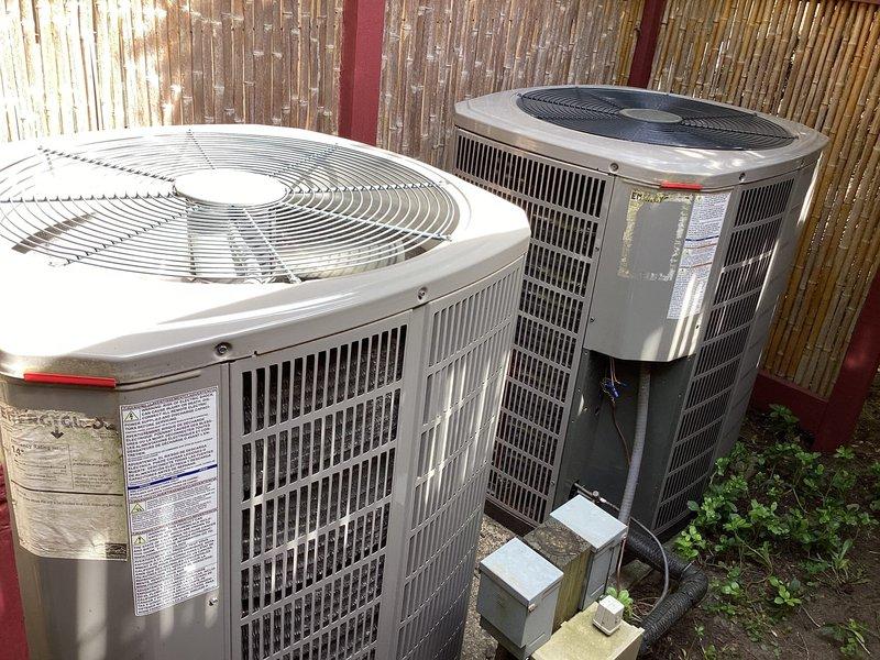Completed comprehensive preventive maintenance on two residential air conditioning systems per manufacturer specifications. Performed thorough inspection, cleaning, and servicing of both outdoor condenser units including coil cleaning to remove accumulated dirt and debris, filter replacement, refrigerant level verification, electrical connection testing, and capacitor evaluation. Replaced humidifier pads on both systems to ensure optimal humidity control and indoor air quality for the upcoming season. All equipment tested and confirmed operating within normal parameters upon completion.