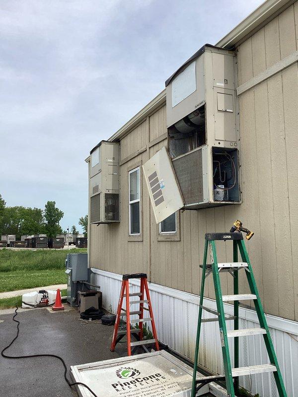 # HVAC Maintenance Summary

Performed planned maintenance tune-up on Bard Manufacturing rooftop unit (model HHA03/EHHA03 series) with R22 refrigerant located at main building. Completed standard preventive maintenance procedures including inspection of electrical components, verification of voltage specifications (208/230V, 60Hz), assessment of compressor motor and indoor/outdoor motor operations, and documentation of unit serial number and specifications for service records.