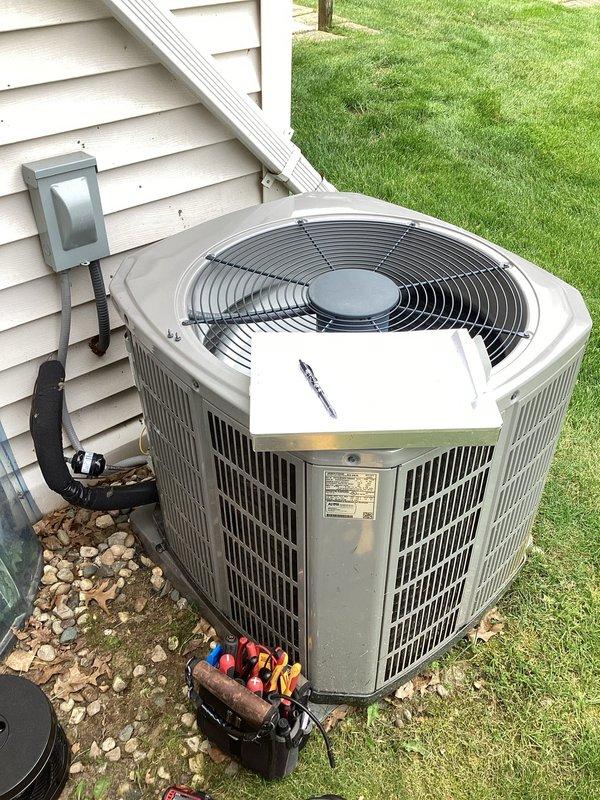 # HVAC Maintenance Service Completed

Performed planned single maintenance on residential air conditioning system under 5 years old. Conducted comprehensive system inspection including electrical components, capacitor, contactor, and all wiring connections. Verified proper operation of outdoor condensing unit with fan assembly and protective grille. Installed CFI filter as specified. Performed diagnostic testing using multimeter on electrical components to ensure proper voltage and amperage readings. Inspected condenser coils, refrigerant lines, and disconnect box. System operating within normal parameters upon completion of maintenance.
