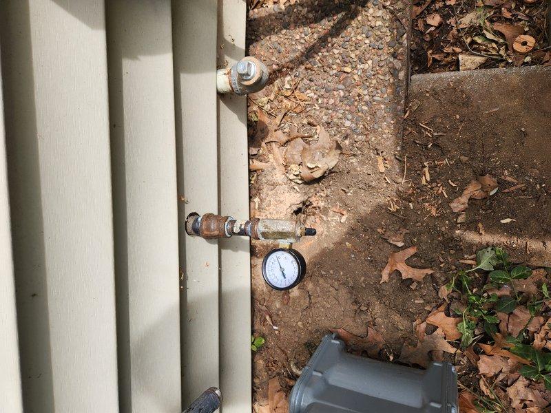 Completed re-run of gas lines using 3/4" Omegaflex flexible gas piping throughout basement and exterior utility areas. Installed new gas distribution lines with proper fittings, securing flexible connectors to structural joists and beams with appropriate mounting hardware. Routed piping alongside existing plumbing and HVAC ductwork, ensuring proper clearances and code-compliant installation. Added red-handled shut-off valves at key connection points for system isolation and safety. Verified all connections for proper sealing and tested system integrity upon completion.