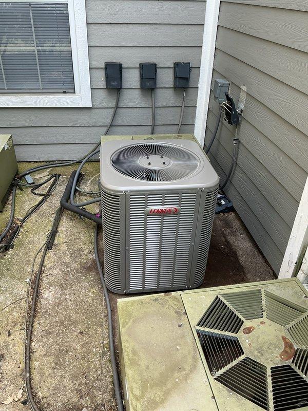 Completed full HVAC replacement for apartment 329-3C, installing a new Lennox air conditioning condenser unit with uncased evaporator coil. The installation included proper electrical connections with junction boxes and disconnect switch, refrigerant line set routing between components, and mounting on concrete pad. System was tested and verified operational upon completion.