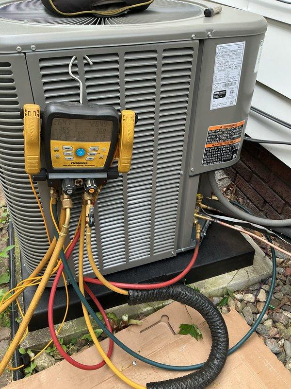Completed installation of Lennox ML13KC1-030 air conditioning condenser unit with matching ADP evaporator coil, replacing existing HVAC system. System was installed on exterior pad, refrigerant lines were connected and insulated, electrical connections completed, and unit was charged with refrigerant to manufacturer specifications. Indoor coil was integrated with existing furnace, all connections were tested and verified operational, and system performance was confirmed using diagnostic gauges to ensure proper pressures and temperatures throughout the refrigeration cycle.