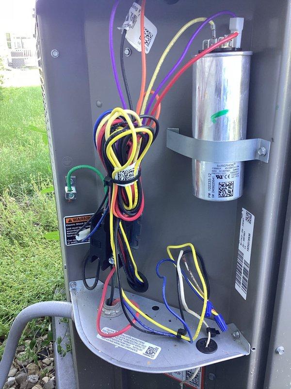 Completed planned air conditioning maintenance on Lennox outdoor condensing unit. Performed comprehensive system inspection including electrical connections, capacitor condition, and overall unit operation. Documented equipment condition with interior control panel and exterior unit photographs showing proper wiring configuration and satisfactory component status.