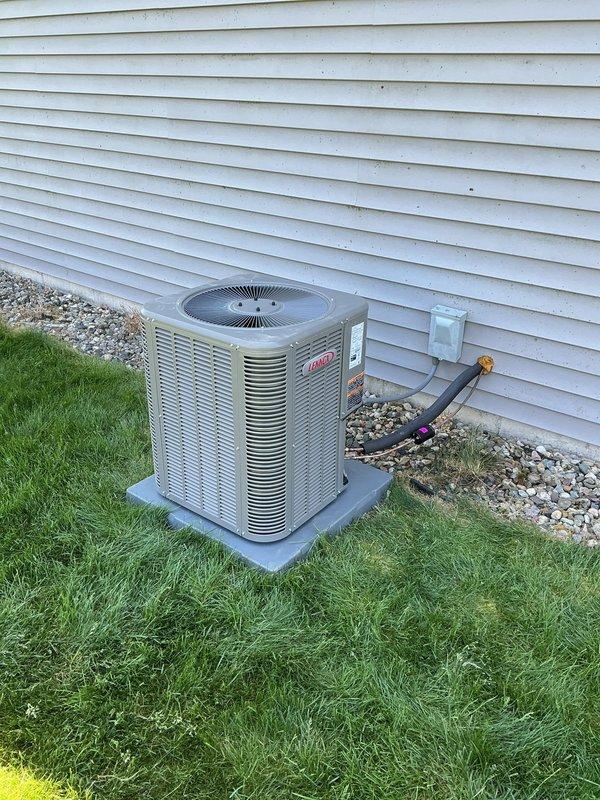 Completed full HVAC system replacement including installation of Lennox ML13KC1-024-230 outdoor condensing unit, Lennox CK40CT-30B-71 coil, and TH4110U2005 thermostat. Unit was properly positioned on concrete pad with appropriate clearances, refrigerant lines were run and insulated, electrical disconnect installed, and all connections completed per manufacturer specifications. System was tested and verified operational.
