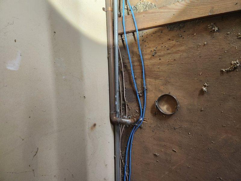 Responded to emergency plumbing call for multiple burst pipes caused by inadequate winterization. Replaced damaged toilet and repaired burst supply line feeding the water storage tank. Installed new copper piping in affected areas and secured all lines properly. Removed and replaced compromised sections of water supply infrastructure, ensuring all connections were leak-free and up to code. System tested and restored to full operation.