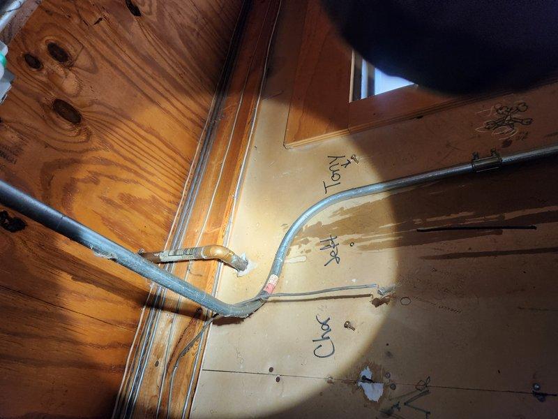 Responded to emergency plumbing call for multiple burst pipes caused by inadequate winterization. Replaced damaged toilet and repaired burst supply line feeding the water storage tank. Installed new copper piping in affected areas and secured all lines properly. Removed and replaced compromised sections of water supply infrastructure, ensuring all connections were leak-free and up to code. System tested and restored to full operation.
