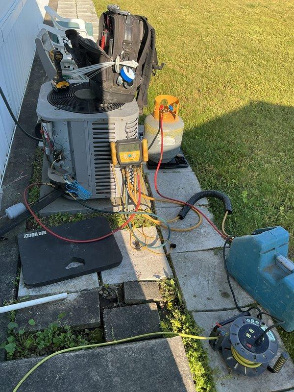 Completed installation of Lennox air conditioning system with ADP downflow evaporator coil at residential property. System was properly commissioned with refrigerant charging, vacuum procedures performed, and all electrical connections verified per manufacturer specifications. Unit tested and confirmed operational with proper airflow and cooling performance.
