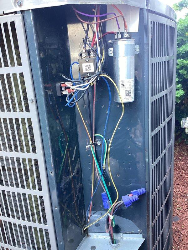 Completed scheduled cooling season maintenance on residential outdoor HVAC unit. Performed comprehensive system inspection including electrical connections, capacitor testing, and condenser coil examination. All components found operating within normal parameters, wiring connections secure, and unit functioning properly for continued cooling operation.