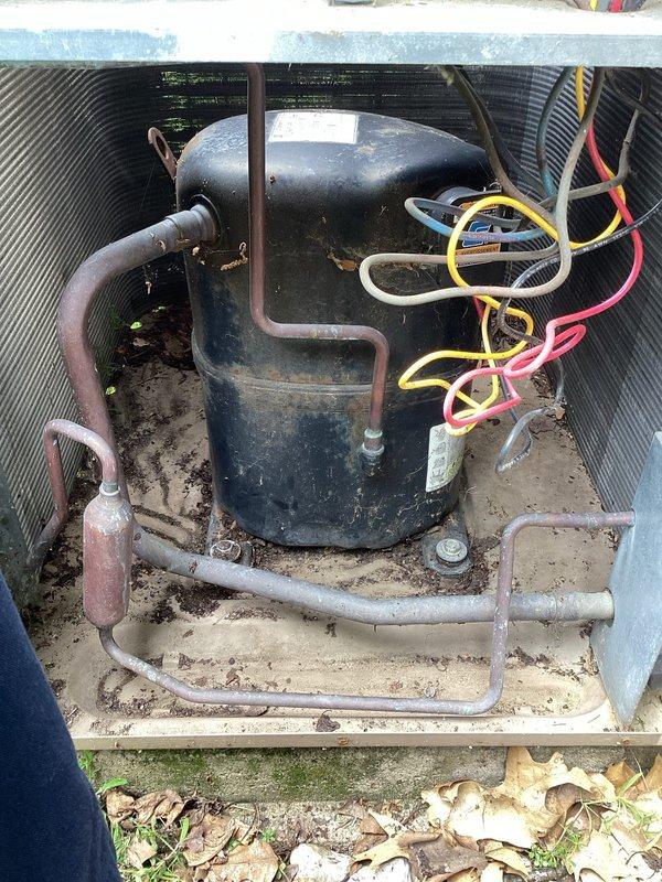 Completed planned air conditioning maintenance on outdoor condensing unit. Performed comprehensive system inspection with access panel removed to evaluate internal components including capacitor, electrical connections, and wiring integrity. Connected refrigerant gauges via service hoses to assess system pressures and verify proper refrigerant charge levels. All electrical connections, compressor, and copper refrigerant lines inspected and found operational.