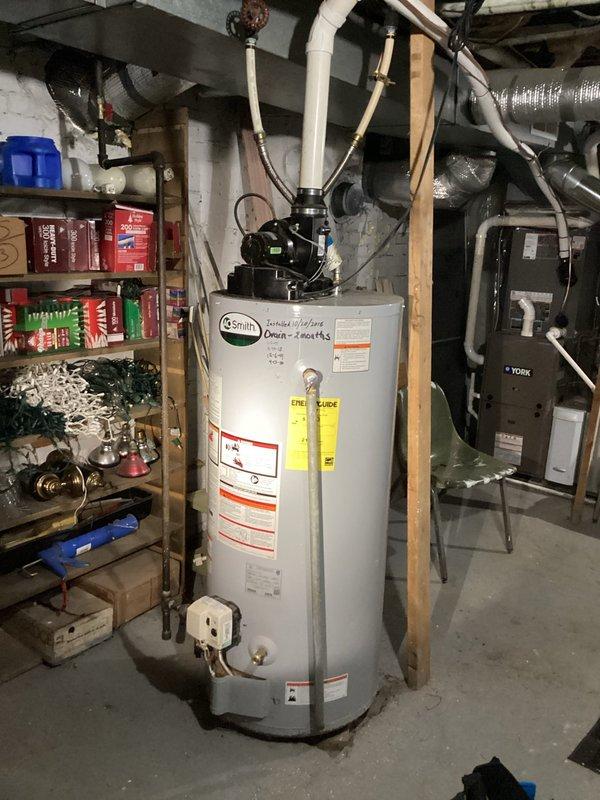 Responded to service call for 10-year-old A.O. Smith tanked water heater producing insufficient hot water. Upon inspection, evaluated unit condition and verified operational status of all components including gas valve, burner assembly, thermostat, and pressure relief valve. Assessed water heater performance in basement utility area alongside existing HVAC system. Documented equipment configuration including piping connections, shut-off valves, and venting system. Customer advised of findings and unit status following diagnostic evaluation.