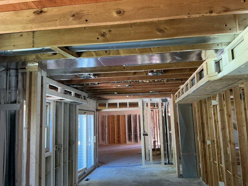 Completed full HVAC system installation in new construction property, including ductwork rough-in throughout basement and main floor areas. Installed metal supply and return ducts with proper sizing and routing through framed walls and ceiling joists, ensuring adequate airflow distribution to all planned living spaces. System is ready for equipment connection and final commissioning once interior finishes are completed.