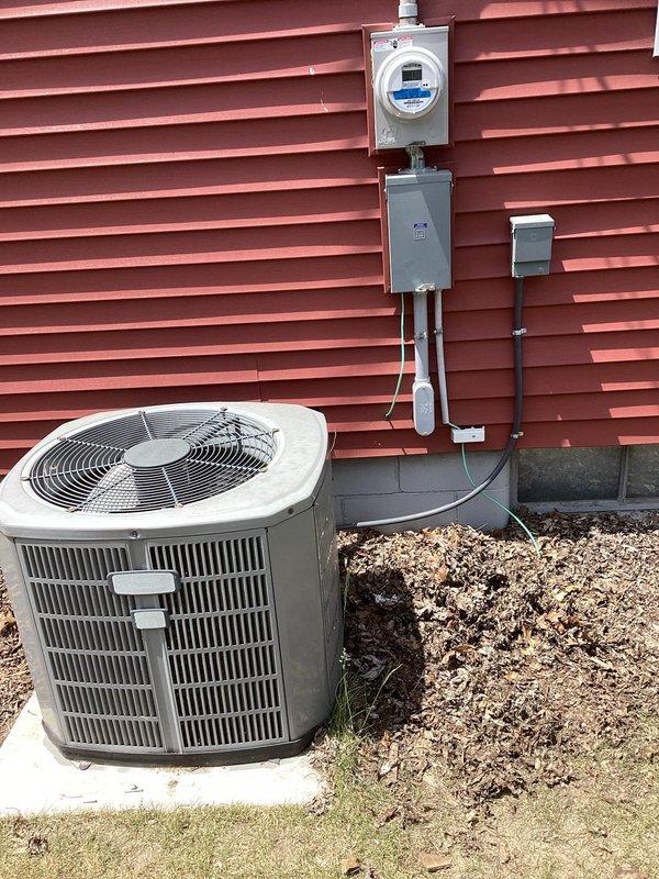 Responded to callback regarding non-functional air conditioning system that was not included in original restoration scope. Upon inspection, discovered existing lineset in basement was severely deteriorated with visible cuts and rust damage, indicating long-term pre-existing condition. Documented exterior condenser unit, electrical connections, and associated components with photographs to assess system viability and provide recommendations for repair or replacement options.