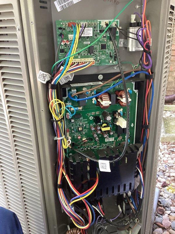# HVAC Membership - A/C Maintenance Completed

Performed comprehensive planned maintenance service on residential air conditioning system. Conducted thorough inspection of outdoor condenser unit, including examination of electrical components, control boards, and wiring connections. Accessed internal control panel to verify proper operation of electronic controls and circuit boards. Inspected copper inductive coils, capacitors, and integrated circuits for signs of wear or damage. Verified all wire connections and harnesses were secure and properly routed. Checked condenser unit mounting on concrete pad and confirmed adequate drainage around equipment. Examined refrigerant line connections, electrical disconnect box, and PVC conduit installations. Documented equipment condition through photographic records. All components found operating within normal parameters. Unit ready for continued service.