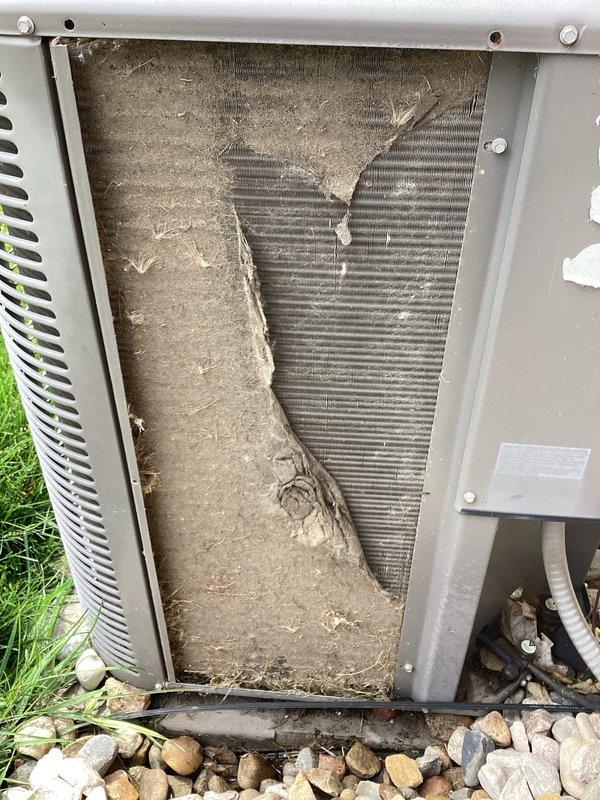 Completed planned maintenance on outdoor air conditioning unit. Upon inspection, found condenser coil heavily clogged with dirt, dust, and debris accumulation, significantly restricting airflow. Cleaned condenser coil thoroughly to restore proper heat transfer efficiency. Inspected electrical compartment components including capacitor, contactor, and wiring connections—all found in operational condition with secure connections and proper grounding. System returned to normal operating parameters following maintenance procedures.