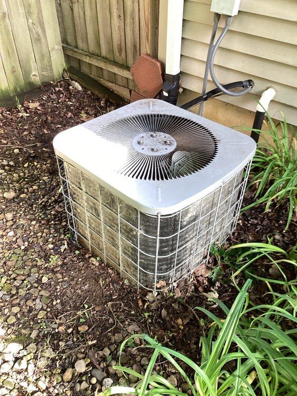 Completed comprehensive tune-up service on a 24-year-old residential air conditioning system. Performed multi-point safety inspection including CO detection, gas leak check, and electrical system evaluation on outdoor condenser unit. System found operating properly with all safety checks passing; customer advised of system age and provided information regarding replacement options for future consideration.