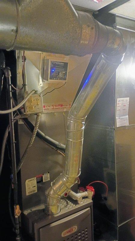 Successfully installed two air scrubber units on the existing HVAC system as specified in the approved quote. The air purification devices were mounted to the air handler and integrated with the ductwork system, with all electrical connections completed and units tested for proper operation. Installation included securing mounting hardware, running necessary wiring, and verifying LED indicator lights showed active operation upon system startup.