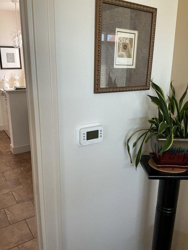 Completed full HVAC system installation including Lennox EL297UH090 high-efficiency furnace, ML17KC2-048 heat pump condenser, CK40CT-36C evaporator coil, and humidifier unit with associated ductwork and controls. Installed new digital thermostat, configured S200 control system with three zones, and verified all equipment operational with proper airflow and refrigerant charge. System tested successfully with all components communicating properly and providing efficient heating and cooling throughout the residence.