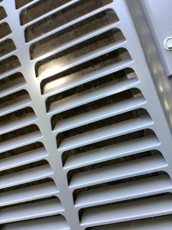 Responded to no cooling complaint on 16-year-old residential HVAC system. Upon arrival, found indoor blower operating but inadequate cooling to occupied space. Inspection revealed severely restricted airflow due to heavily clogged air filter with substantial dust and debris accumulation throughout pleated media. Filter obstruction was causing significant reduction in system airflow, preventing proper heat exchange at evaporator coil and resulting in insufficient cooling capacity. Replaced dirty filter with new unit to restore proper airflow. Verified return air grille condition and cleared accumulated dust from vent components. System airflow restored to normal operation, allowing adequate cooling performance to resume.