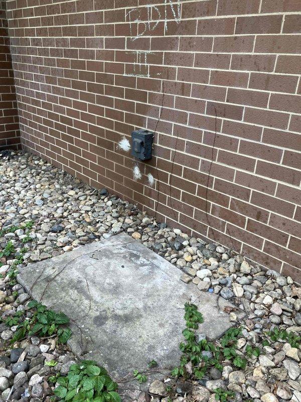 # HVAC Estimate - AC Replacement

Conducted site assessment for air conditioning system replacement at residential property. Inspected existing outdoor unit location, which consists of concrete equipment pad positioned at building exterior corner with brick wall foundation and river rock landscaping. Evaluated electrical infrastructure including weatherproof disconnect box mounted on brick wall with conduit routing. Documented current site conditions through photographic survey to determine equipment access, clearance requirements, and existing electrical service configuration. No operational unit present for age verification or performance testing. Prepared replacement estimate based on site conditions, electrical service availability, and standard installation requirements for new air conditioning system.