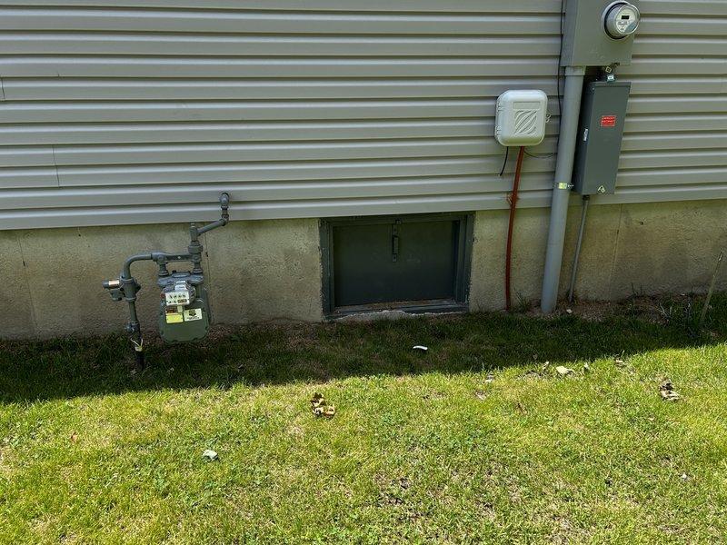 Conducted on-site evaluation for installation of new gas line from existing meter to Firman 10,000-watt portable generator located in garage. Assessed current gas meter configuration with existing U-shaped piping assembly and determined optimal routing path for new supply line. Evaluated access options including lift-assisted entry through garage door and sliding patio door for equipment and materials delivery. Documented existing conditions including generator placement, meter location on exterior foundation wall, and proximity to electrical service panel. Provided comprehensive estimate for gas line installation project.