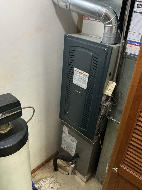 Completed full HVAC system installation featuring a Lennox ML13KC1-024 condensing unit paired with a CK40DT-30/36B evaporator coil and compatible furnace. Removed and reinstalled existing furnace to accommodate proper coil placement, adding a 3-inch spacer beneath the evaporator coil to ensure adequate gravity drainage and prevent condensate backup. System tested and verified operational with all components functioning within manufacturer specifications.