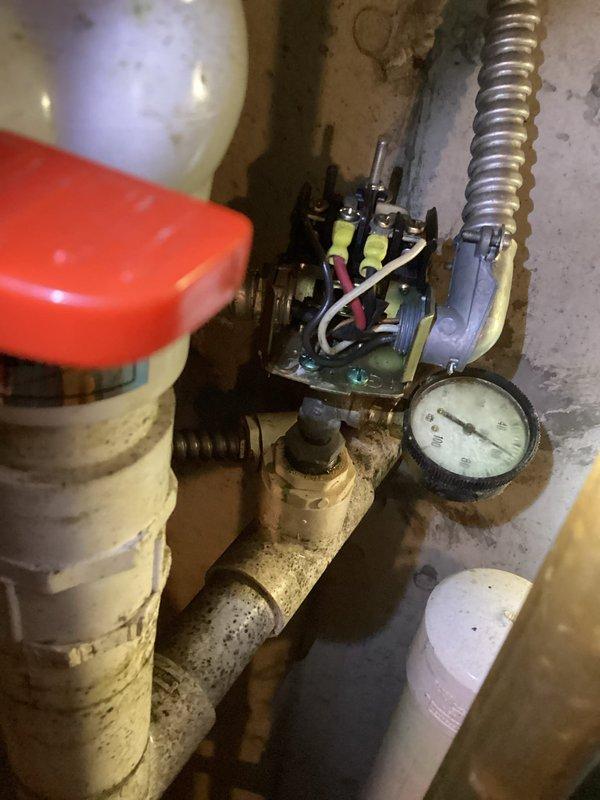 Responded to no-water emergency at 35-year-old residence following recent storms. Upon arrival, confirmed complete loss of water supply throughout home affecting all fixtures and toilets. Investigated well system components in basement utility area, inspecting pressure tank, pressure switch, electrical connections, and control wiring. Found pressure switch contacts required attention and verified proper electrical supply to well pump contactor. Restored water service to full system functionality with all fixtures and toilets operating normally.

Additionally performed scheduled preventive maintenance on 2-year-old air conditioning system. Completed standard tune-up procedures including inspection of electrical connections, refrigerant pressures, condenser coil condition, and overall system operation. Unit found in good working order with no deficiencies noted. System operating within manufacturer specifications.