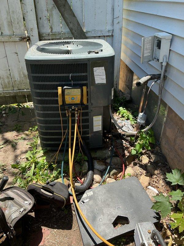 Responded to service call for refrigerant leak at indoor evaporator coil. Successfully located and repaired leak, then replaced line filter-drier to ensure system cleanliness and prevent future compressor damage. Performed nitrogen pressure test to verify leak repair integrity, evacuated system to proper vacuum levels, and recharged unit to manufacturer specifications. System tested and confirmed operational with proper pressures and temperatures upon completion.