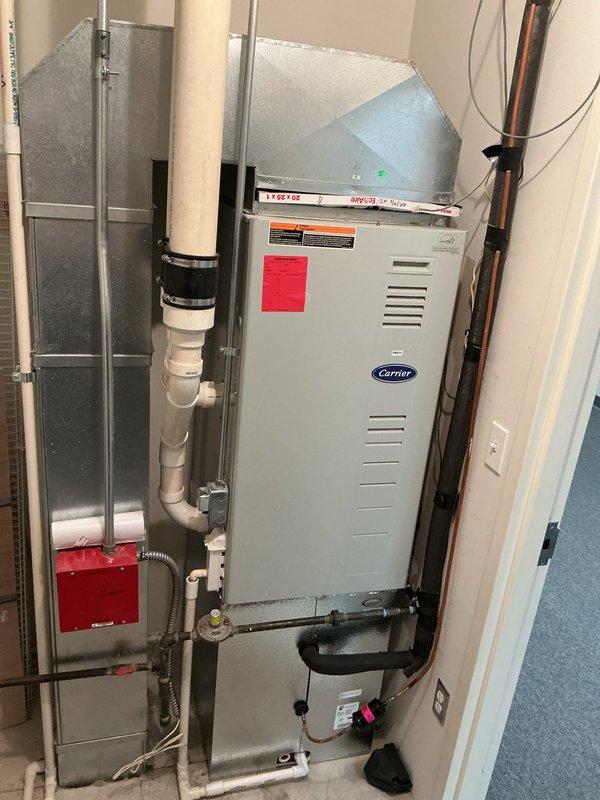 Picked up and installed ML14XC1-048-233 evaporator coil from Mid-City supply house. Removed existing furnace, installed new evaporator coil, and reinstalled Carrier furnace unit in utility closet. Connected refrigerant lines, condensate drainage system, and verified proper airflow through ductwork. System tested and operational with thermostat reading 68°F.