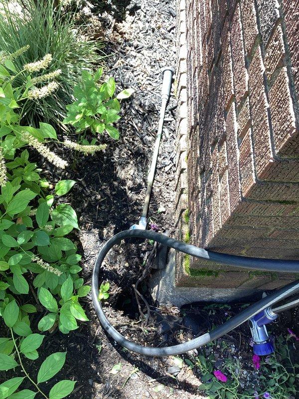 Responded to service request for outdoor spigot relocation and replacement. Upon arrival, assessed existing hose bib installation along exterior wall and evaluated optimal repositioning based on accessibility and landscaping layout. Successfully relocated and replaced outdoor spigot assembly, including supply line rerouting through exterior wall penetration. Installed new frost-proof sillcock with proper pitch for drainage, secured mounting hardware to structural framing, and sealed wall penetration to prevent water intrusion. Tested water flow and verified no leaks at connection points or valve seat. Confirmed proper operation of shutoff mechanism and hose attachment threads.