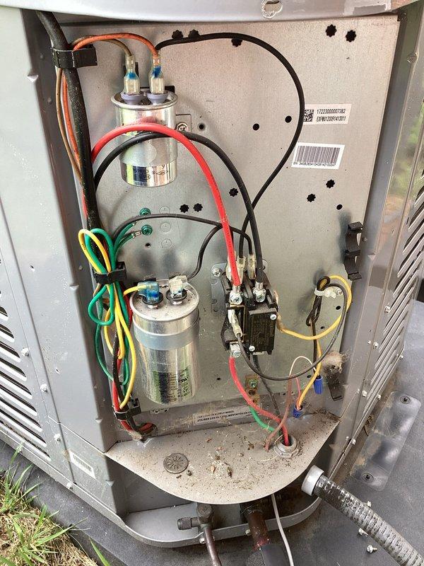 Completed planned dual-system air conditioning maintenance on two residential condensing units positioned side-by-side at exterior location. Performed comprehensive preventive maintenance procedures including inspection of electrical components, capacitors, contactors, and wiring connections within control panels, cleaned condenser coils, checked refrigerant levels using manifold gauges, and replaced two 16x25x1 air filters per maintenance protocol.