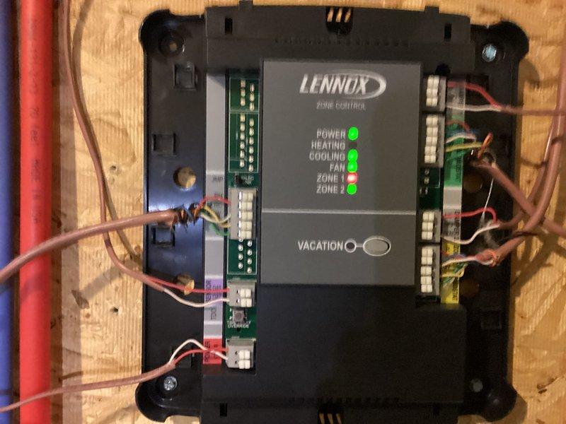 Responded to service call for 15-year-old Lennox zoned AC system with upstairs cooling issues. Upon inspection, found malfunctioning zone damper preventing proper airflow to second floor zone. Inspected Lennox zone control panel and verified power supply, control wiring connections, and zone call indicators. Examined motorized damper actuator in ductwork serving upstairs zone and identified failed damper motor causing damper to remain in closed position. Tested zone control board functionality and confirmed proper signal output to damper. Replaced defective zone damper actuator, verified proper damper operation through full range of motion, and tested system operation in cooling mode. Confirmed adequate airflow to upstairs zone and proper temperature control across both zones. System restored to normal operation with all zones responding correctly to thermostat calls.