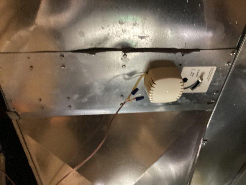 Responded to service call for 15-year-old Lennox zoned AC system with upstairs cooling issues. Upon inspection, found malfunctioning zone damper preventing proper airflow to second floor zone. Inspected Lennox zone control panel and verified power supply, control wiring connections, and zone call indicators. Examined motorized damper actuator in ductwork serving upstairs zone and identified failed damper motor causing damper to remain in closed position. Tested zone control board functionality and confirmed proper signal output to damper. Replaced defective zone damper actuator, verified proper damper operation through full range of motion, and tested system operation in cooling mode. Confirmed adequate airflow to upstairs zone and proper temperature control across both zones. System restored to normal operation with all zones responding correctly to thermostat calls.