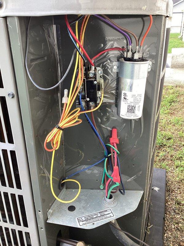 Completed annual planned maintenance on 4-year-old outdoor HVAC system. Performed comprehensive inspection of unit exterior, verified proper placement on equipment pad, and confirmed adequate clearance from structure. Removed access panel and conducted thorough internal component inspection. Tested electrical connections and components including capacitor, contactor, and control wiring using diagnostic equipment with alligator clip leads. Verified all wire connections secure across multiple circuits including power, control, and safety wiring. Inspected capacitor condition and mounting. System operating within normal parameters upon completion of maintenance procedures.