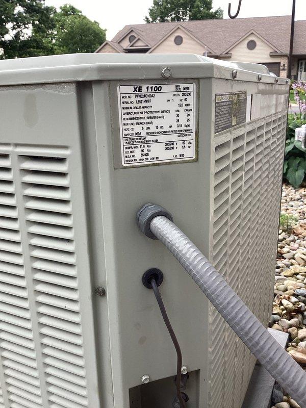 Responded to no cooling complaint on 30-year-old residential air conditioning system. Upon arrival, performed diagnostic evaluation of Trane XE 1100 model TWR036C100A1 outdoor condensing unit. Documented existing equipment condition showing significant age-related wear, oxidation on refrigerant lines, and overall system deterioration consistent with unit exceeding expected service life. Provided customer with assessment findings and replacement recommendations due to system age and obsolescence of components.