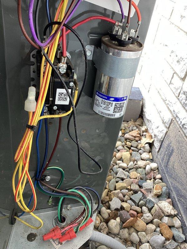 Completed annual Gold Level planned maintenance on a 3-year-old residential HVAC system. Performed comprehensive inspection of outdoor condensing unit including electrical control panel, capacitor, contactor, and all wiring connections. Verified proper operation of all electrical components and checked refrigerant lines. Noted moisture accumulation in bottom of electrical panel and addressed drainage concerns. Customer provided their own air filters for this service visit. All system components operating within normal parameters upon completion of maintenance procedures.