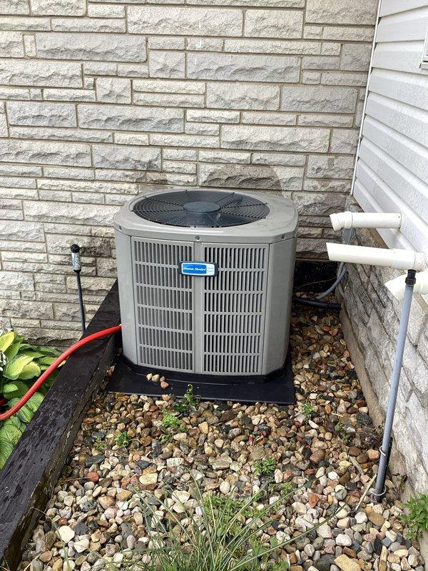 Completed annual Gold Level planned maintenance on a 3-year-old residential HVAC system. Performed comprehensive inspection of outdoor condensing unit including electrical control panel, capacitor, contactor, and all wiring connections. Verified proper operation of all electrical components and checked refrigerant lines. Noted moisture accumulation in bottom of electrical panel and addressed drainage concerns. Customer provided their own air filters for this service visit. All system components operating within normal parameters upon completion of maintenance procedures.