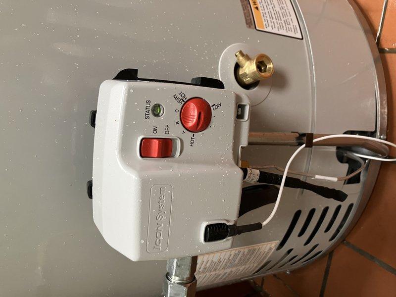 # Water Heater Ignition System Failure

Responded to service call for 15-20 year old tanked water heater with pilot light that would not remain lit. Upon arrival, confirmed unit was not producing hot water and pilot would not stay ignited. Verified gas supply was functioning properly to rule out fuel delivery issues.

Performed diagnostic inspection of the Econ-System control unit and ignition components. Testing confirmed the ignitor assembly had failed and was no longer generating spark to light the pilot. Examined the thermocouple and gas control valve for proper operation. Assessed the overall condition of the aging unit, noting significant corrosion on copper supply lines and general wear consistent with the unit's age.

Given the failed ignitor on a 15-20 year old water heater that has exceeded its typical service life, discussed repair versus replacement options. Explained that while the ignitor could be replaced, the unit's advanced age and visible deterioration of associated p