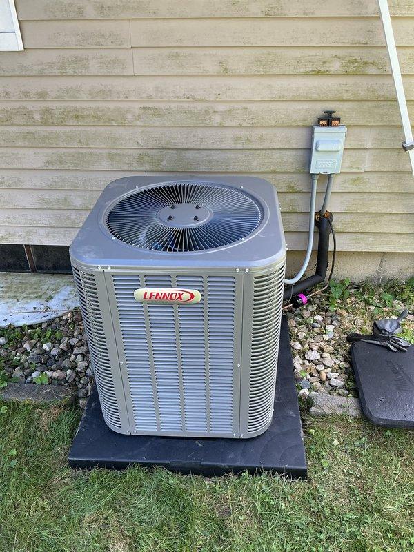 Completed full HVAC system installation including ML180UH045 furnace, ML13KC1-024 condenser unit, CK40UT-24A uncased evaporator coil, and thermostat. Fabricated custom coil shelf in plenum transition to accommodate uncased coil from previous inventory. Installed 1410 air cleaner and positioned outdoor condenser unit on pad against exterior wall with proper refrigerant line connections and electrical disconnect. System tested and operational upon completion.