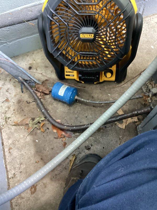 Completed planned duo maintenance on two HVAC systems with ages of 6 months and 15 years. Performed comprehensive inspection of outdoor condenser units, including examination of electrical components, capacitors, wiring connections, and overall system operation. Documented equipment condition with photos showing access to electrical compartment and component testing procedures, confirming both systems are functioning properly for continued operation.