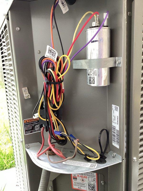 Completed comprehensive planned maintenance visit and system diagnostic on residential air conditioning unit. Performed full system evaluation including indoor and outdoor unit inspection, thermostat operation verification, and carbon monoxide detector check. Recorded system performance metrics with indoor temperature at 69°F and outdoor ambient at 91°F. Measured and documented superheat within acceptable range of 16-26°F and confirmed proper indoor air temperature drop of 18°F (return air 68°F, supply air 51°F). Verified electrical components including contactor operation, disconnect voltages at 240V/120V/120V, and motor amp draws at 7.3A and 3.5A, all within manufacturer specifications. Inspected internal wiring connections, capacitor condition, and all electrical components for proper operation and safety. System operating efficiently with all parameters meeting manufacturer requirements.
