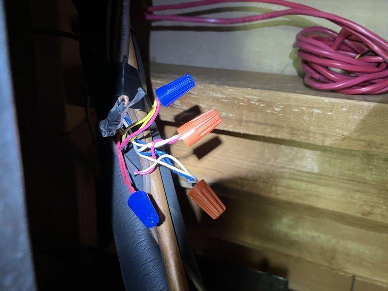 Responded to no cooling complaint on 5-year-old residential air conditioning system blowing warm air with adequate airflow and no ice buildup present. Diagnosed failed compressor contactor and defective dual run capacitor preventing compressor operation. Replaced faulty contactor with new 30-amp single-pole unit and installed manufacturer-specified dual run capacitor. Completed electrical connections with proper wire nuts, verified secure terminations at outdoor condensing unit, tested system operation with compressor engaging properly, and confirmed cold air delivery at supply registers.