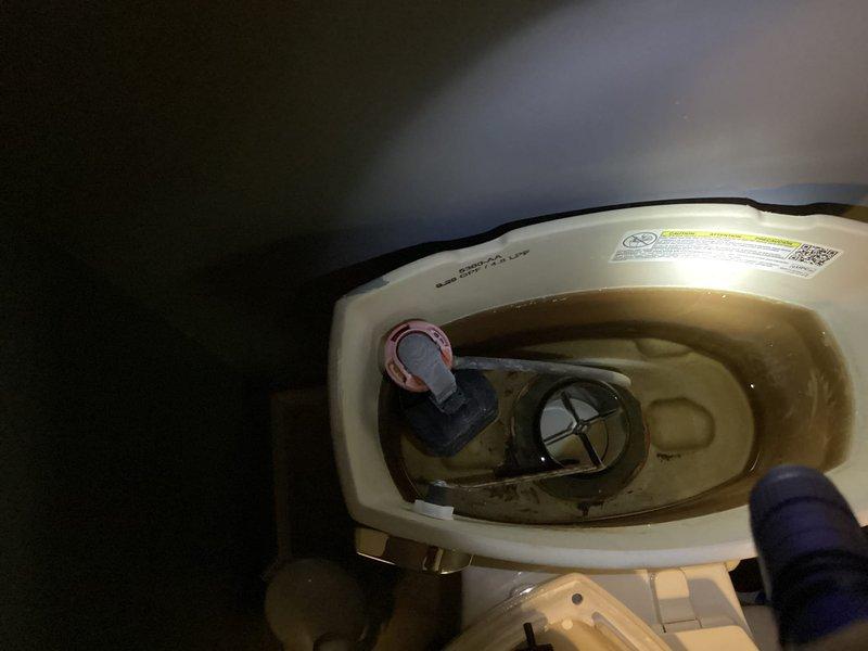 Responded to basement bathroom for toilet repair. Upon inspection, found the flush valve cylinder lift mechanism had broken off inside the tank. Removed toilet tank lid and assessed internal components. Flapper valve and float assembly were intact but cylinder lift arm was fractured and non-functional. Replaced defective cylinder lift assembly with new component. Tested flush mechanism for proper operation and verified complete tank refill cycle. Toilet restored to full working condition.
