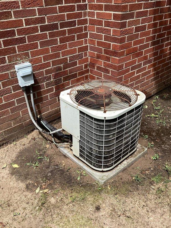 Completed first annual planned maintenance visit on 6-month-old HVAC system under Gold Level maintenance agreement. Performed comprehensive inspection of outdoor condenser unit and electrical components. Replaced 16x25x5 air filter as part of routine maintenance protocol. Inspected capacitor, electrical connections, and wiring harness at outdoor disconnect; noted functional operation with minor weathering on exterior components. Verified refrigerant lines, conduit routing, and electrical disconnect box mounting. Confirmed proper fan operation and airflow through condenser coil. System operating within normal parameters with no immediate service needs identified.